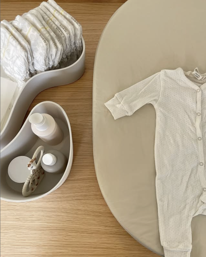 وسادة تغيير بيضاوية الشكل - لون حجر